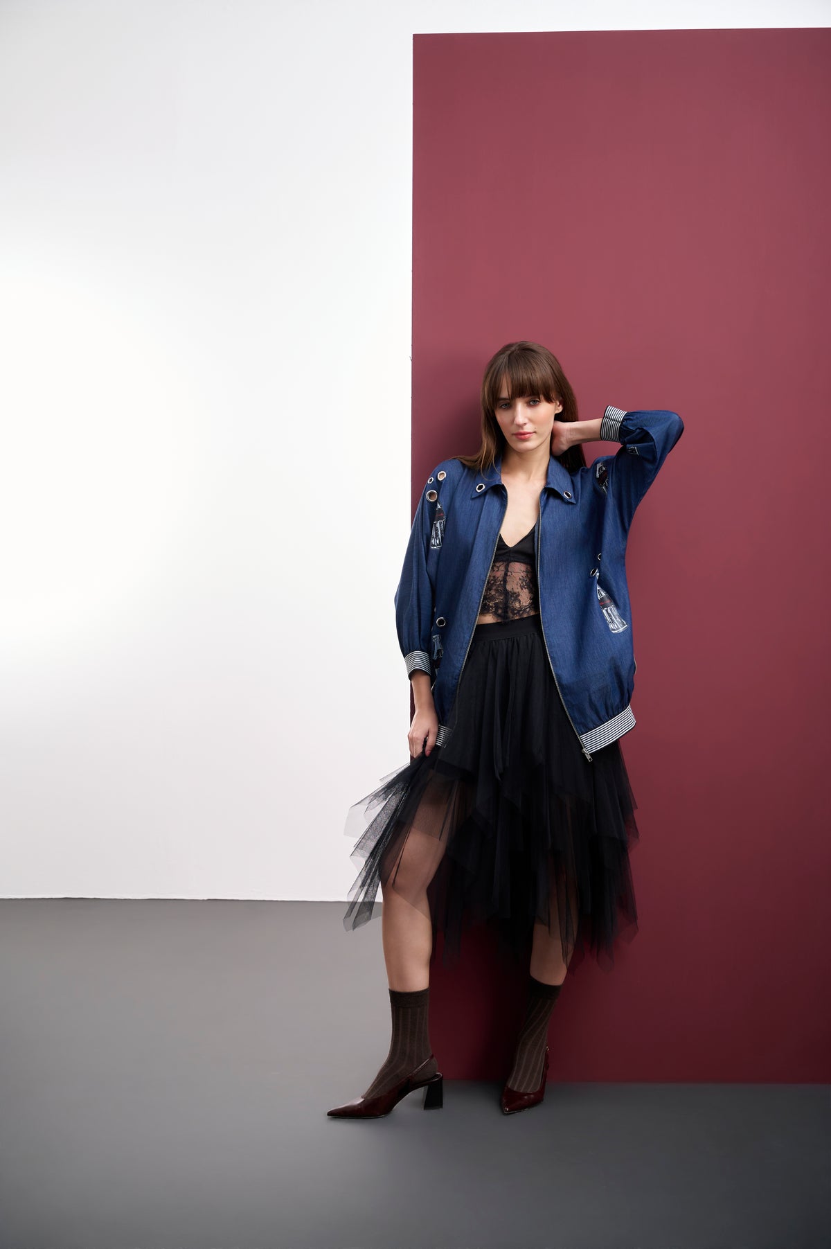 BLUE DENIM POP-ART BOMBER JACKET WITH EYELET ACCENTS