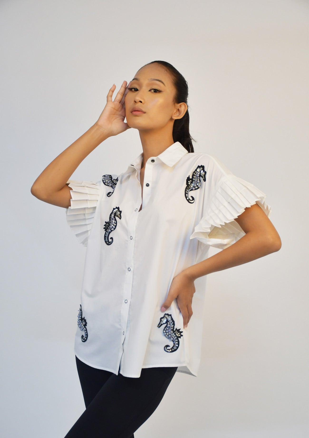 White Shirt with Pleated Sleeves and Seahorse Embroidered Motifs