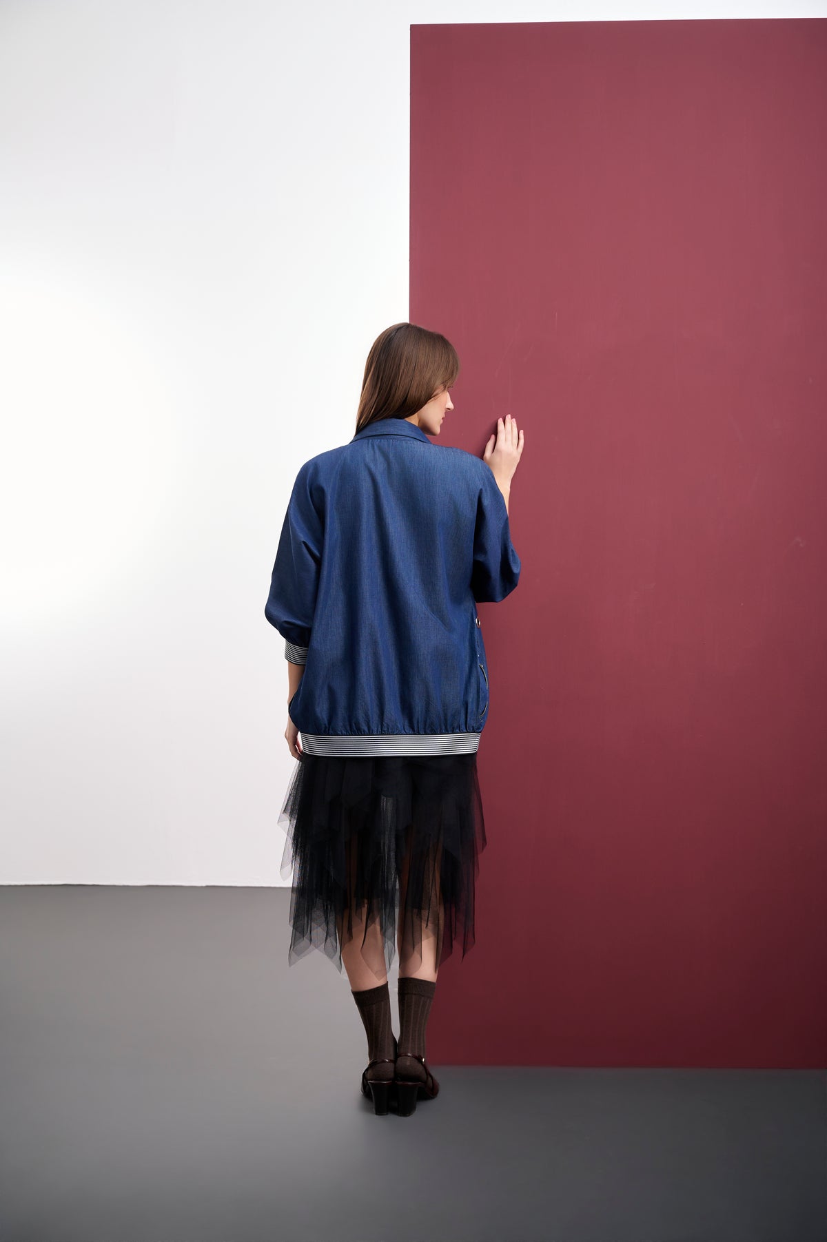 BLUE DENIM POP-ART BOMBER JACKET WITH EYELET ACCENTS