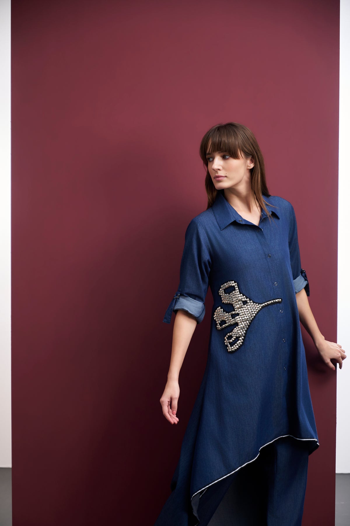 BLUE DENIM HIGH-LOW TUNIC WITH STUDDED LEAF MOTIF