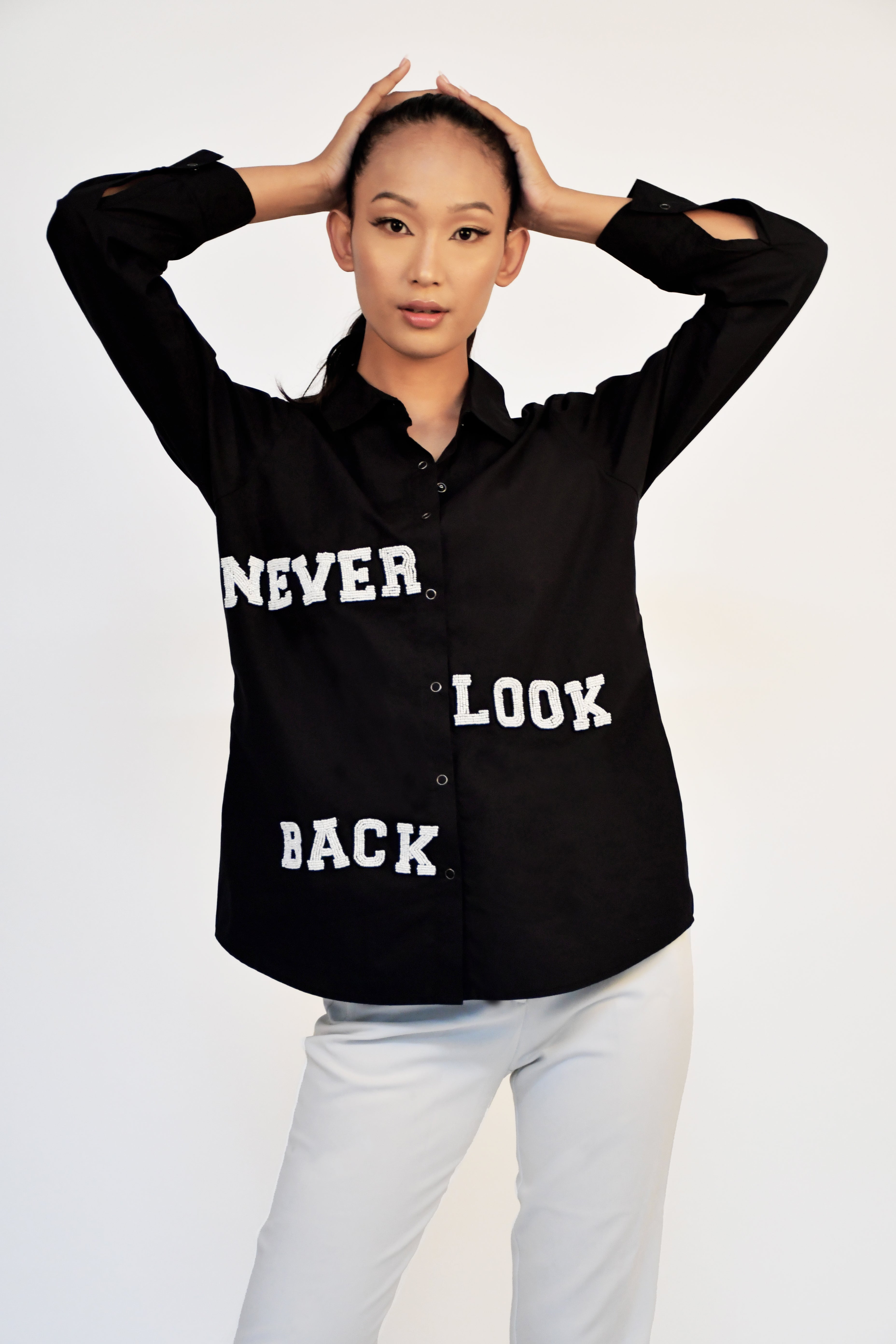 BLACK SHIRT WITH "NEVER LOOK BACK" WHITE BEADED EMBROIDERY