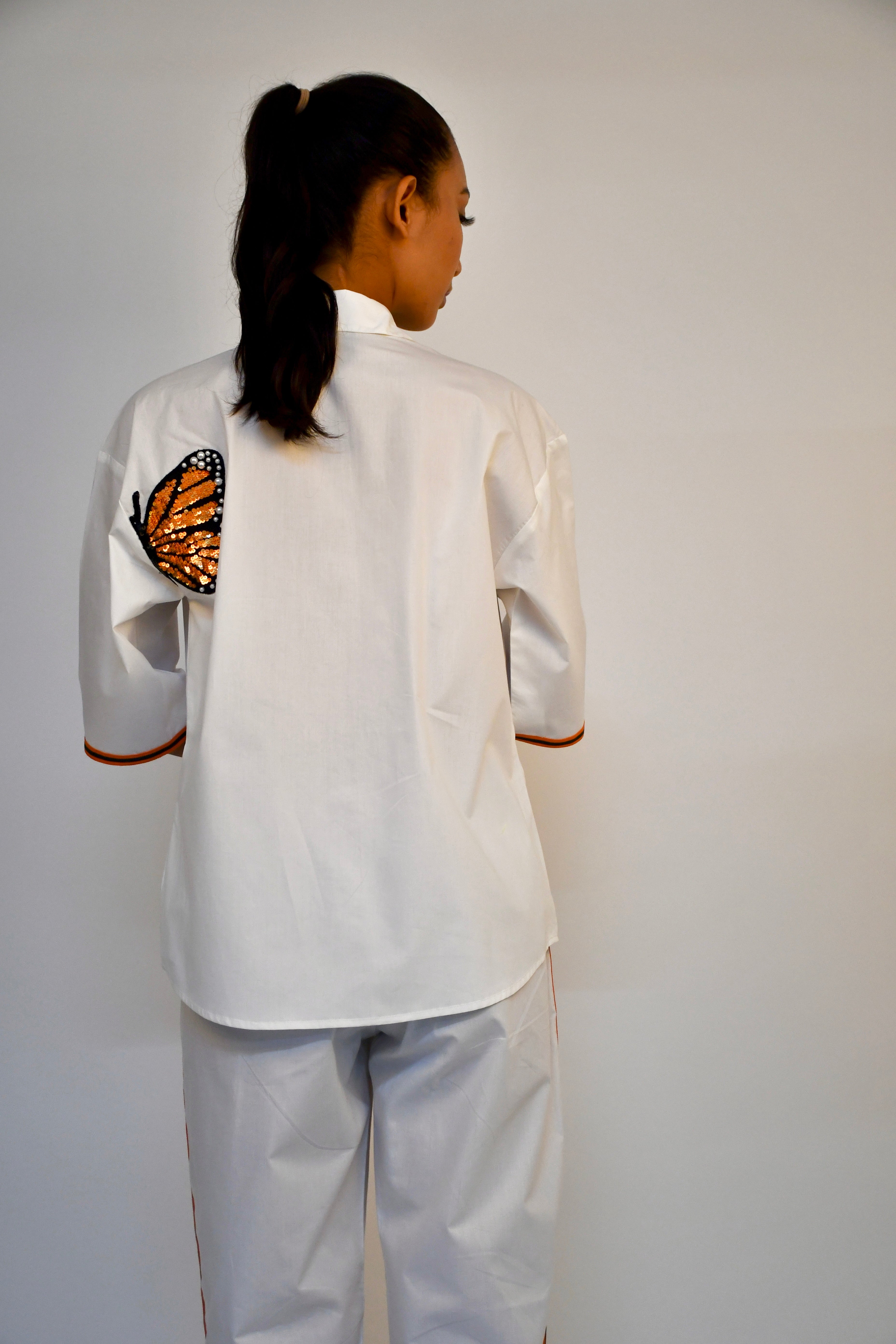 WHITE COTTON SHIRT AND STRAIGHT PANTS WITH ORANGE FLOWER AND BUTTERFLY EMBROIDERY