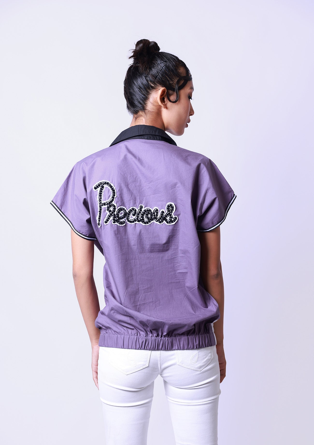 Lilac / White Cotton Half Zipper Bomber Top With Embroidered Pocket With Slogan Embroidererd On Lilac Back