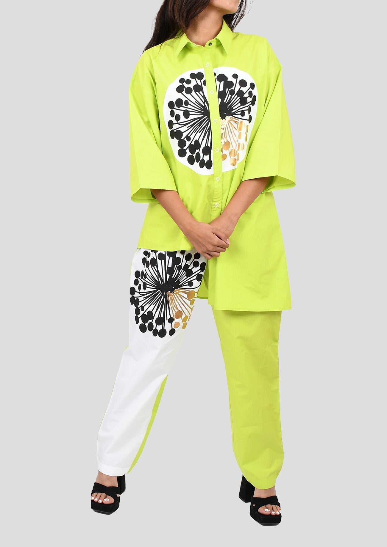 Neon Green Cotton Highlow Oversized Shirt With Curated Black And Gold Foil Print & Green And White Straight Cotton Pants With Curated Black And Gold Foil Print